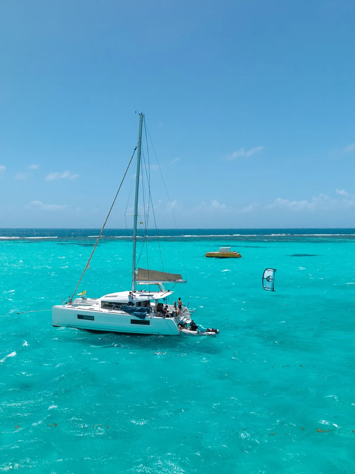 Catamaran anchored in turquoise Grenadines water