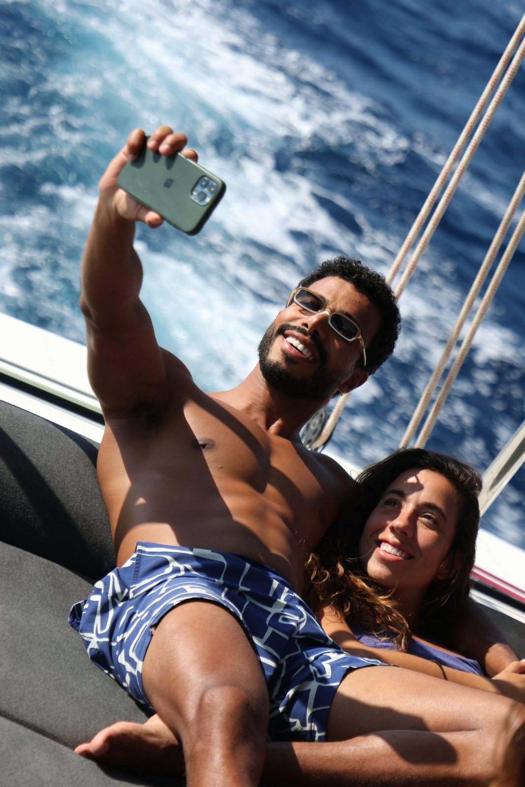 Two guests taking a selfie while sailing