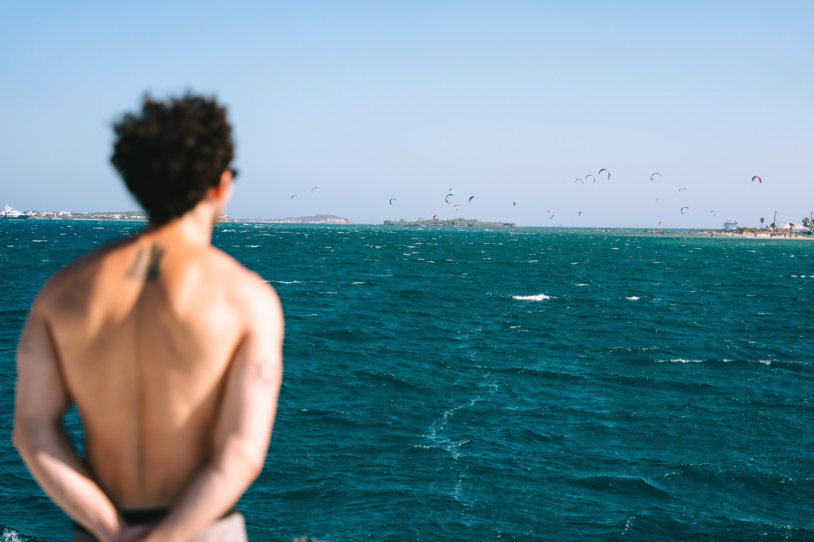 Guest watching the kite spot from the boat