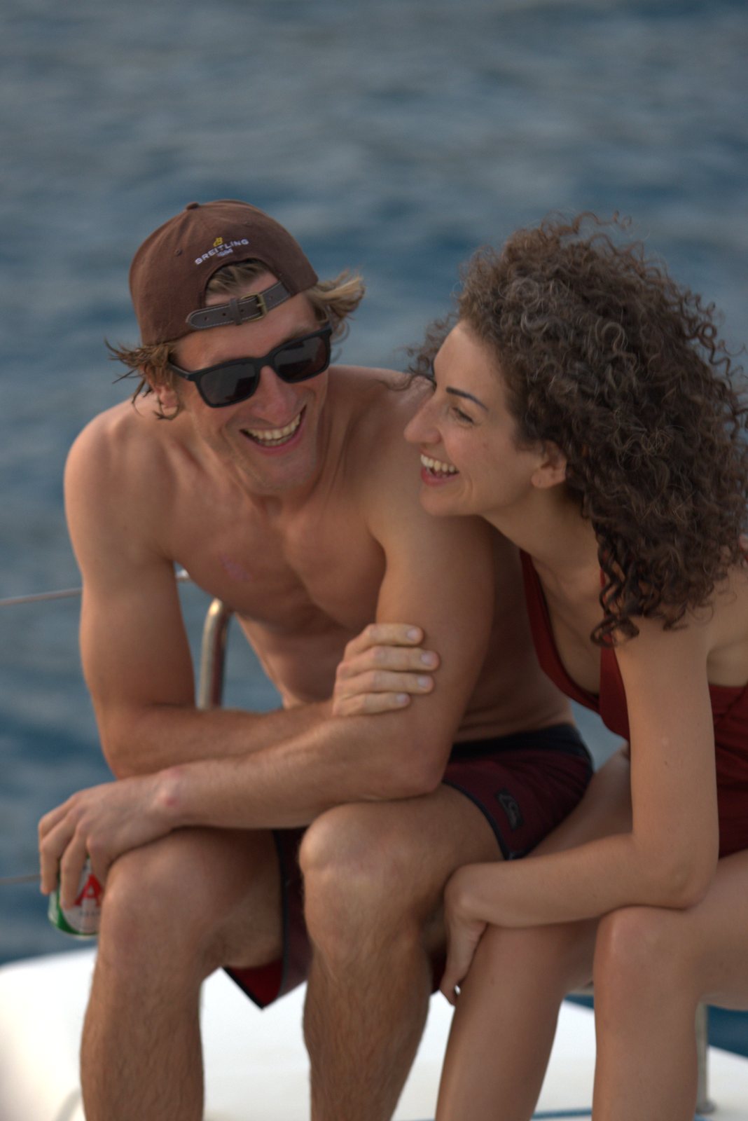 Two guests laughing on deck