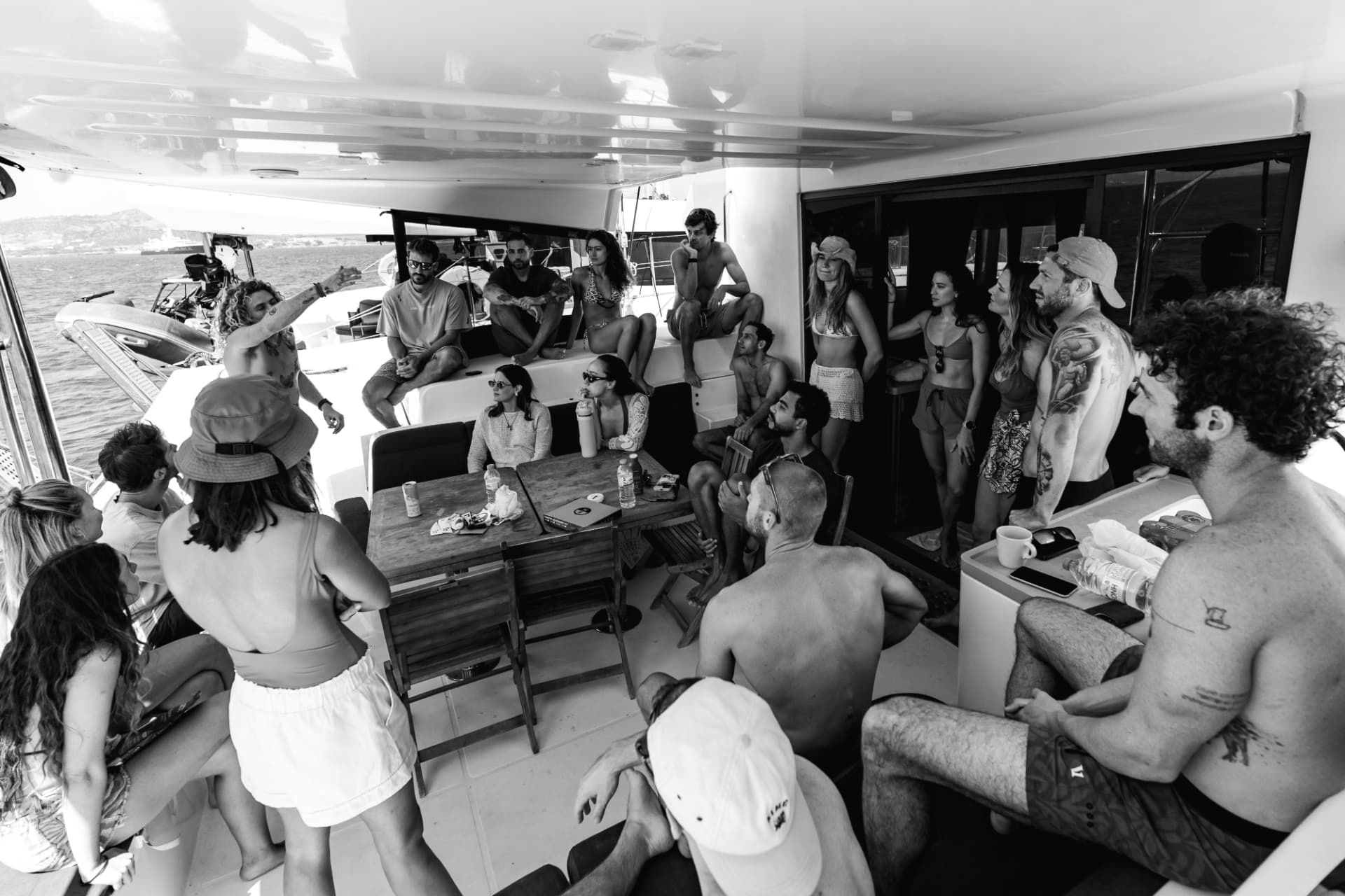 Kitesurf briefing around the cockpit table before a session